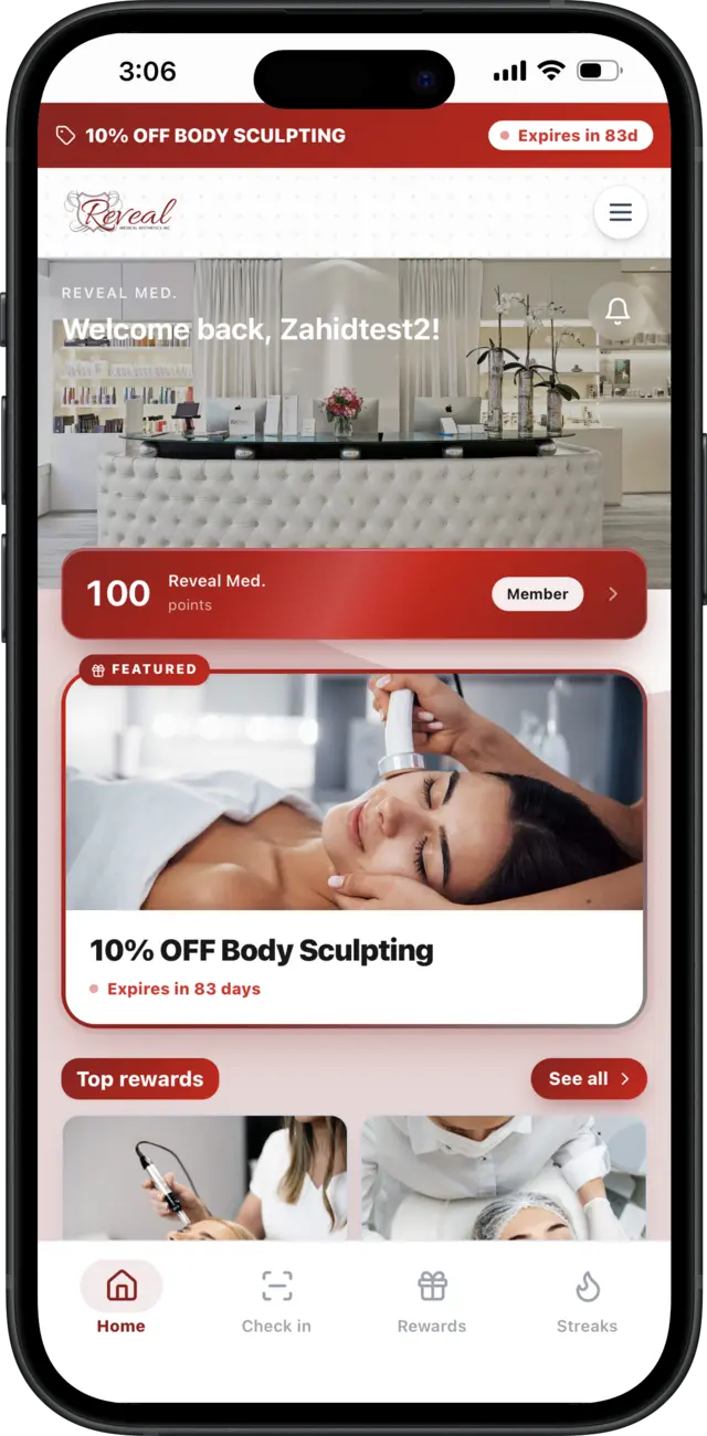 Reveal Medical Aesthetics rewards app on an iPhone — red-branded home screen with a body sculpting offer